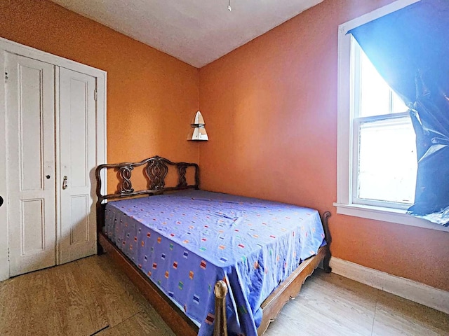 bedroom featuring hardwood / wood-style floors