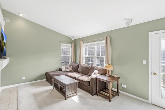 2574 Golf Ridge Cir, Naperville, IL 60563 - living room with light colored carpet, lofted ceiling, a healthy amount of sunlight, and baseboards