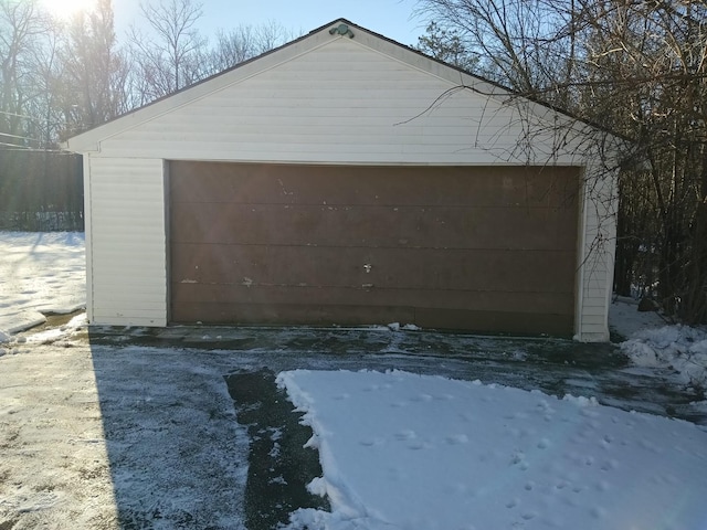 view of snow covered garage