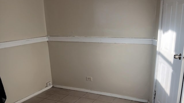 interior space with light tile patterned floors