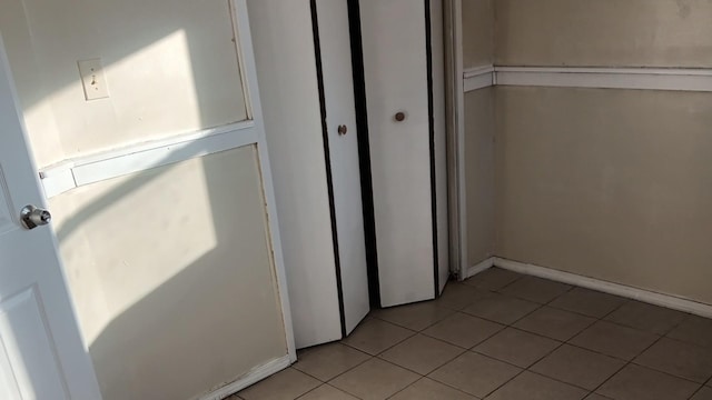 interior space featuring light tile patterned flooring