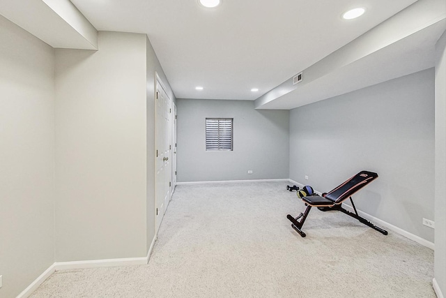 workout area with light colored carpet