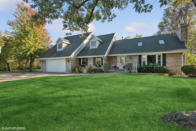 cape cod home with a garage and a front yard