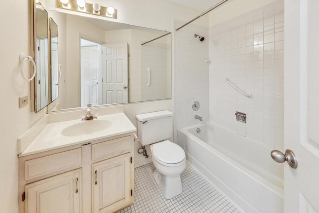 full bathroom with vanity, tile patterned flooring, tiled shower / bath combo, and toilet