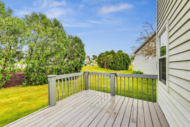 deck featuring a yard