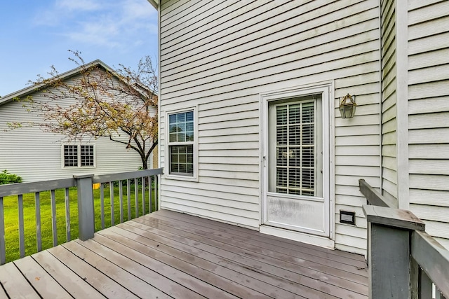 deck featuring a lawn