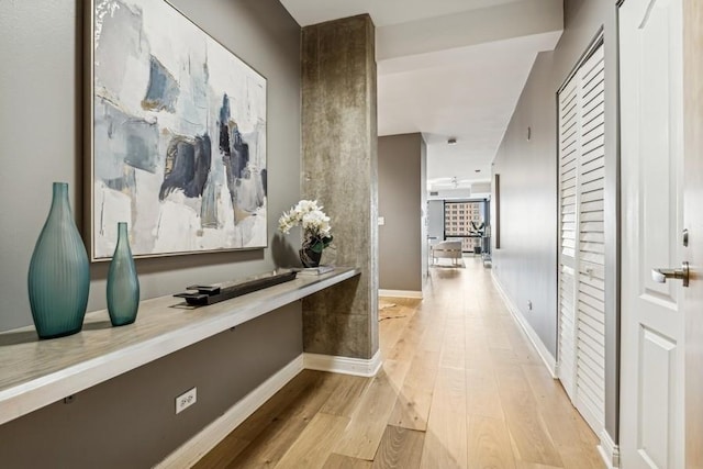 hallway featuring light wood-type flooring