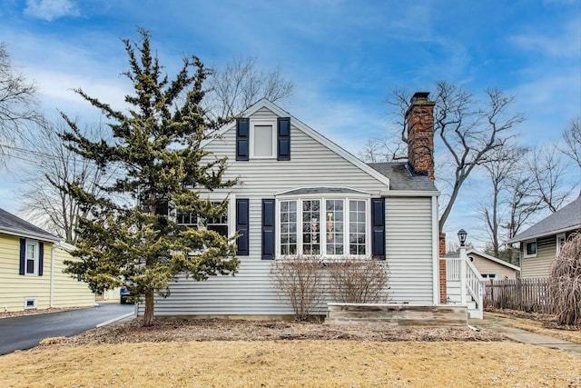 view of property exterior featuring a yard