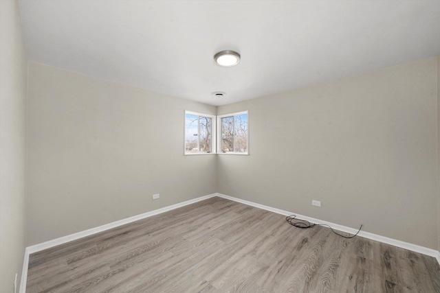 empty room with light wood-type flooring