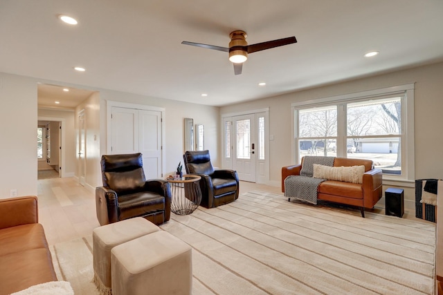 living room featuring ceiling fan