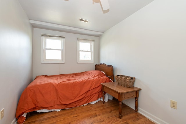 bedroom featuring ceiling fan and light wood-type flooring