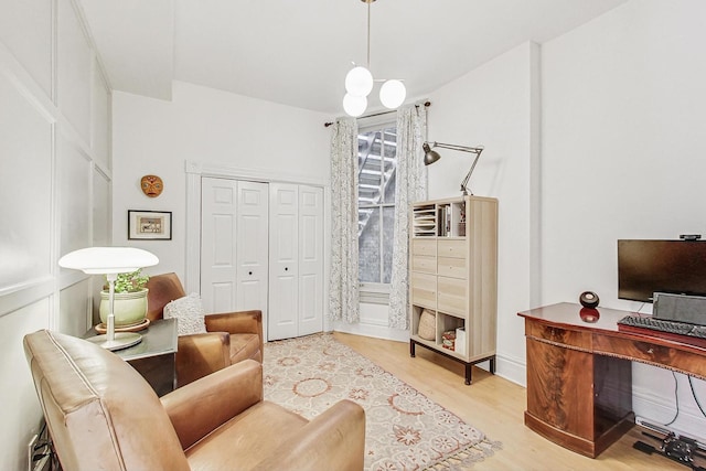 sitting room featuring light hardwood / wood-style floors