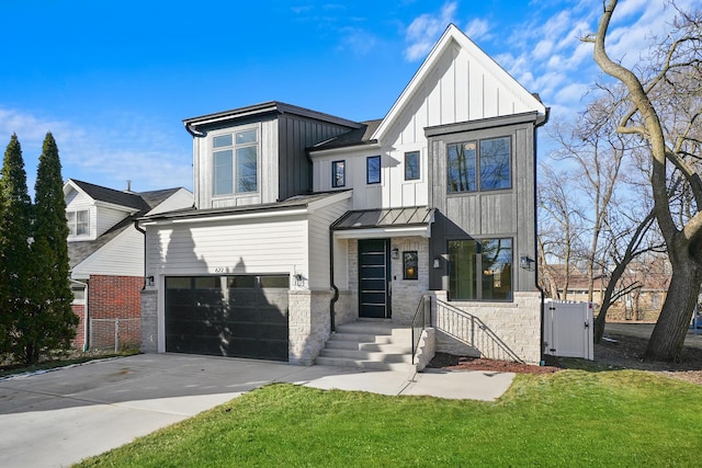 modern farmhouse style home featuring a garage and a front yard