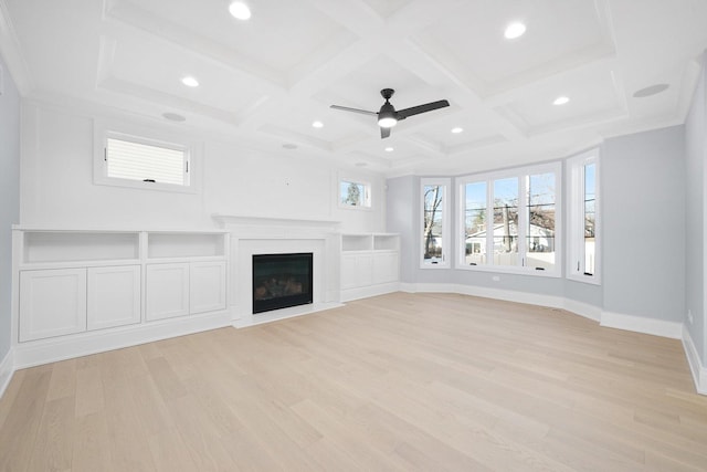 unfurnished living room featuring coffered ceiling, beam ceiling, light hardwood / wood-style floors, and ceiling fan