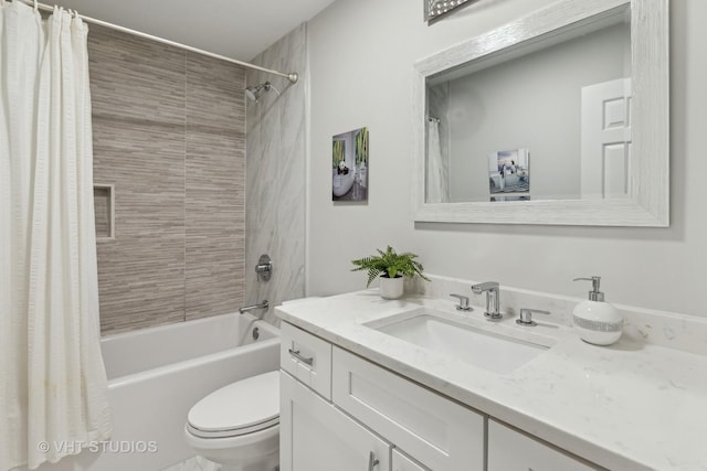 full bathroom featuring shower / bathtub combination with curtain, vanity, and toilet