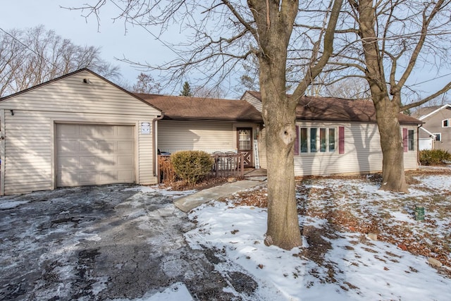 single story home with a garage