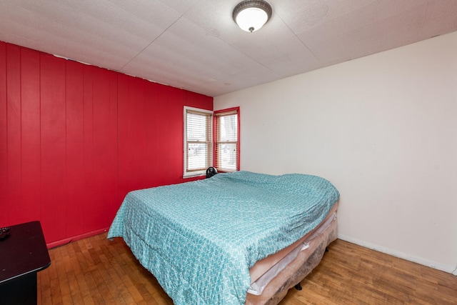 bedroom featuring hardwood / wood-style floors