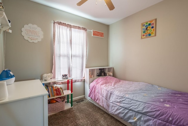 bedroom with ceiling fan and carpet