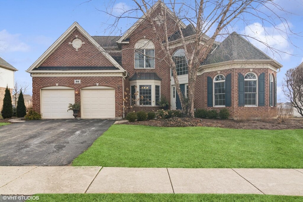 view of front of home with a front yard