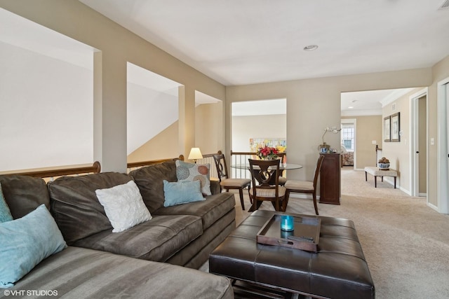 living room featuring light carpet