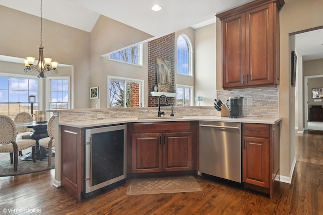 kitchen featuring wine cooler, sink, dark wood-type flooring, and dishwasher