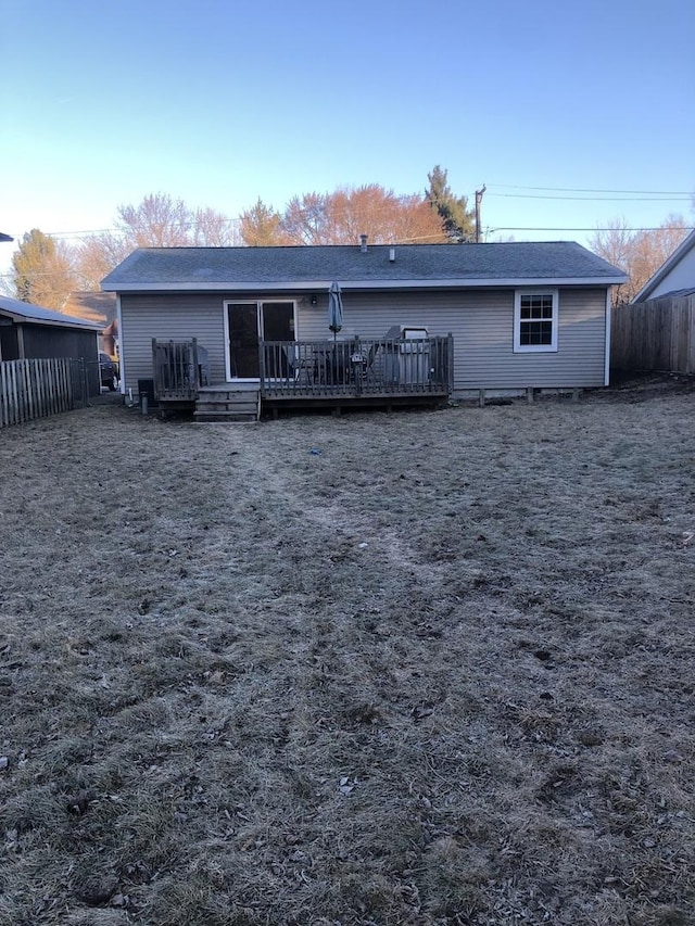 rear view of property with a deck