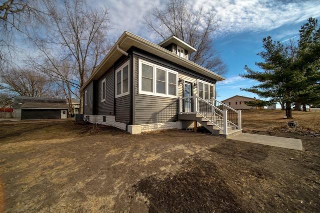 view of front of home featuring central AC unit