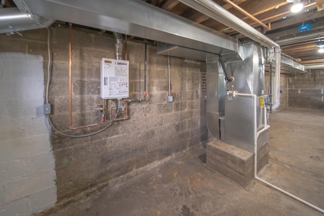 utility room featuring heating unit