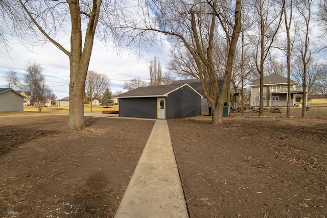 view of front of house with an outbuilding