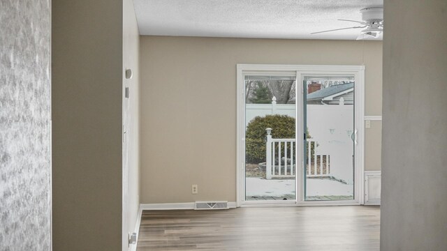 spare room with dark hardwood / wood-style flooring