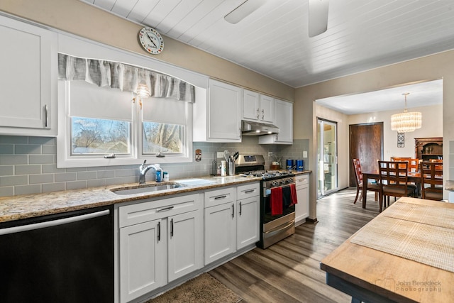 kitchen featuring dark wood-type flooring, sink, gas range, white cabinetry, and dishwasher