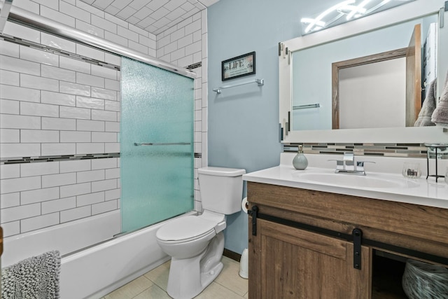 full bathroom featuring toilet, tasteful backsplash, shower / bath combination with glass door, vanity, and tile patterned flooring