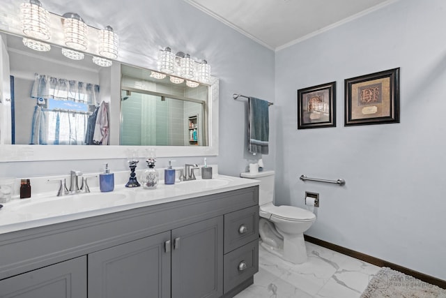 bathroom with vanity, crown molding, toilet, and walk in shower