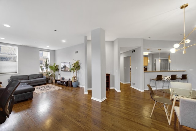 living room featuring dark hardwood / wood-style floors