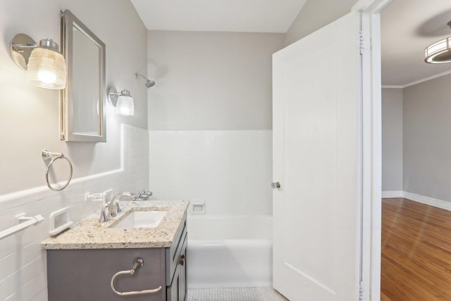 bathroom featuring hardwood / wood-style flooring and vanity