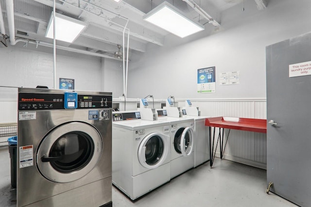 washroom with washing machine and dryer