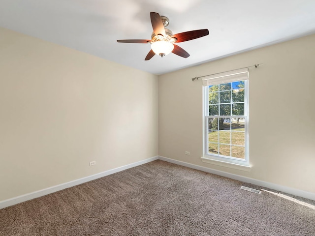 carpeted empty room with ceiling fan