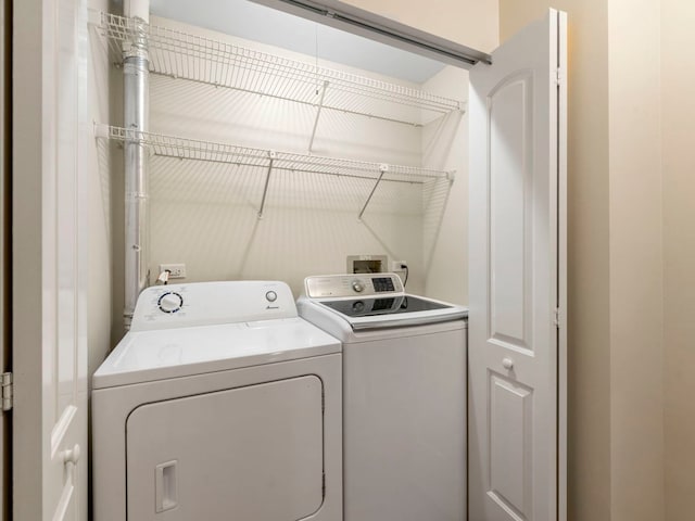 laundry room featuring washer and dryer