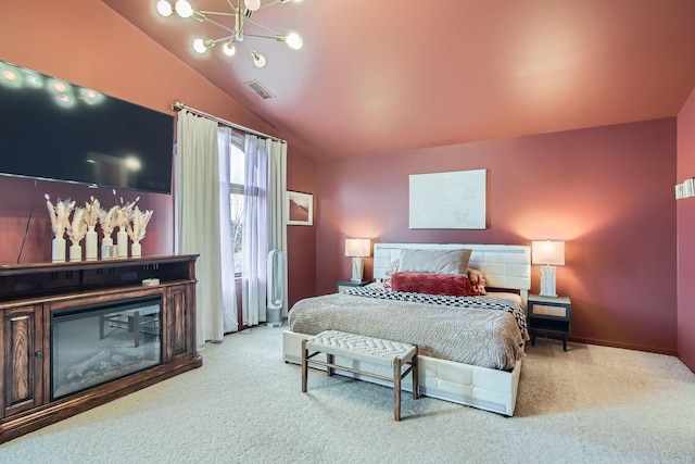 carpeted bedroom with vaulted ceiling and an inviting chandelier