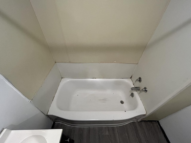 bathroom featuring a tub to relax in