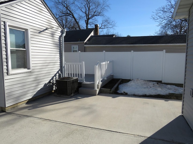 view of patio with central AC