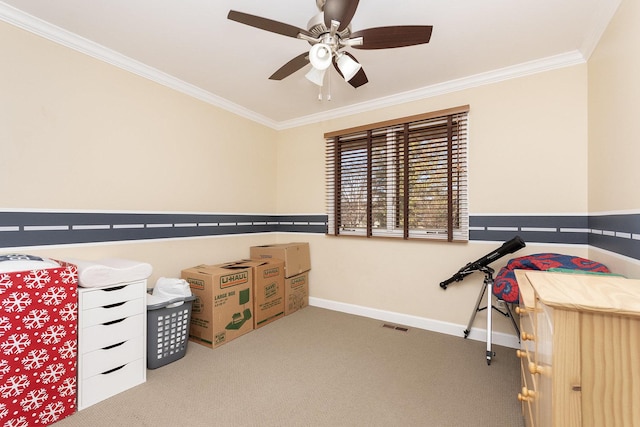 interior space featuring crown molding, carpet, and ceiling fan