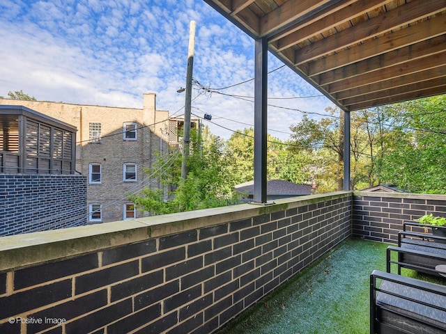 view of patio / terrace with a balcony