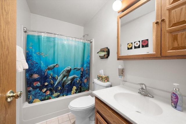 full bathroom with vanity, tile patterned floors, toilet, and shower / bath combo with shower curtain