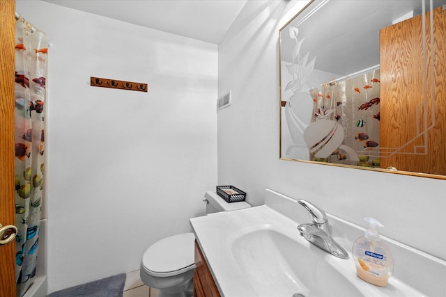 bathroom featuring walk in shower, vanity, and toilet