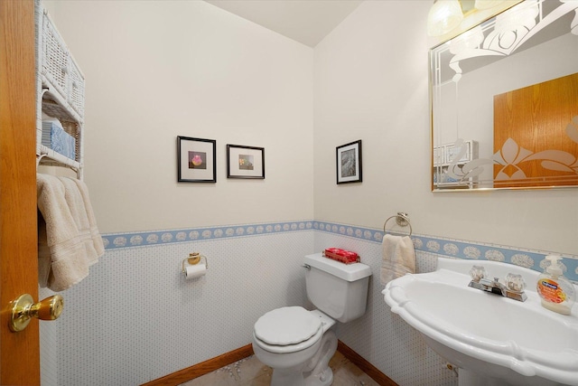 bathroom with sink and toilet