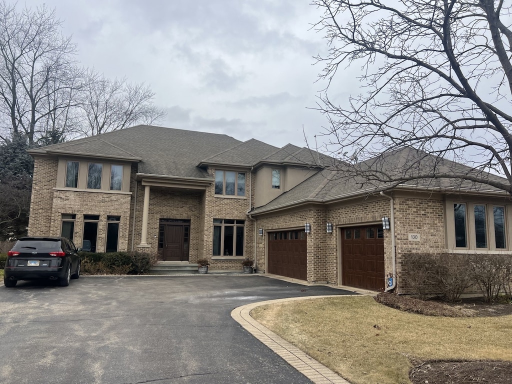 prairie-style house featuring a garage