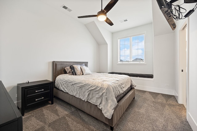 bedroom with ceiling fan and dark carpet