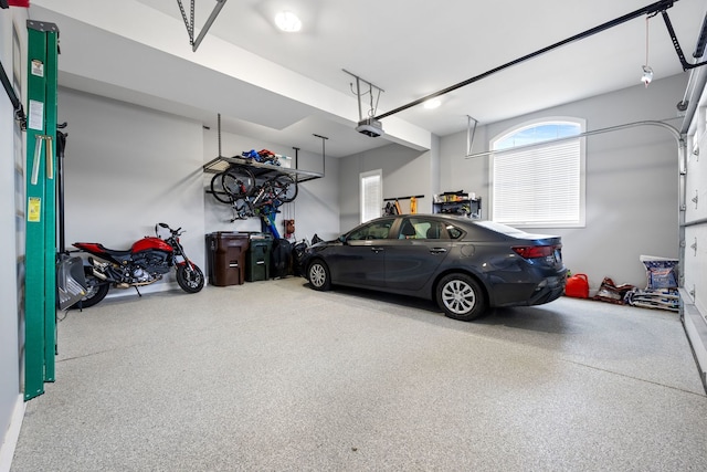 garage featuring a garage door opener