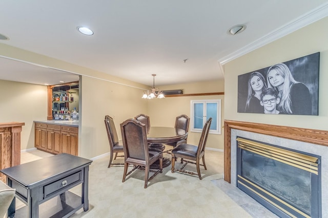 carpeted dining area with crown molding and a chandelier